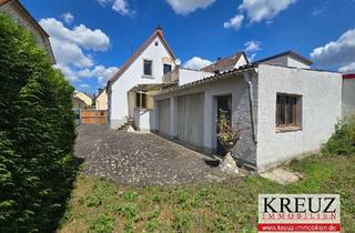 Einfamilienhaus kaufen in 64521 Groß-Gerau, Kleines Einfamilienhaus mit 2 Garagen in zentraler Stadtlage, renovierungsbedürftig
