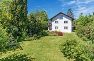 Haus kaufen in 82166 Gräfelfing, Familienfreundliches Domizil mit Möglichkeiten zur Erweiterung und zauberhaftem Garten