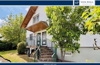 Einfamilienhaus kaufen in 35418 Buseck, Feel Good - behagliches Einfamilienhaus mit Wintergarten in ruhiger Lage