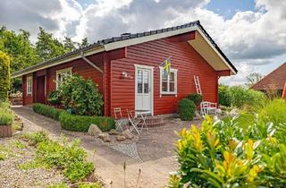 Haus kaufen in Dorfstraße 19a, 24256 Stoltenberg, Dänisches Holzhaus auf einer Ebene in dörflicher Lage