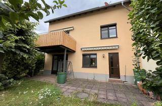 Haus kaufen in Am Hinteren Schloß, 99817 Stedtfeld, Gepflegte, großzügige DHH, u. a. mit Wohn-UG (Elw.), Balkon, Terrasse, Stellplatz u. Garage