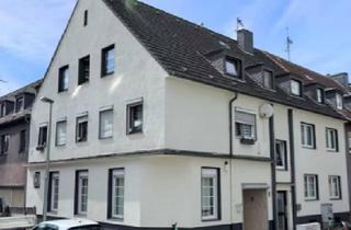 Wohnung kaufen in Herwarthstraße 17, 47137 Untermeiderich, Stilvolle Eigentumswohnung mit Garten & Kamin mit luxuriöser Innenausstattung mit EBK in Duisburg