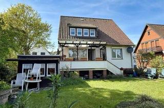 Haus kaufen in 30926 Seelze, Solides Zweifamilienhaus mit Keller auf einem herrlich eingewachsenen Grundstück in Dedensen