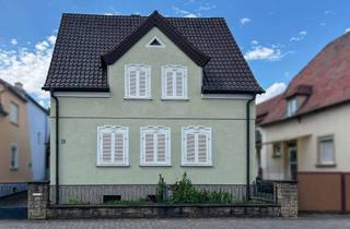 Haus kaufen in 76756 Bellheim, Charmantes Wohnhaus mit Potenzial - Garage und großer Garten