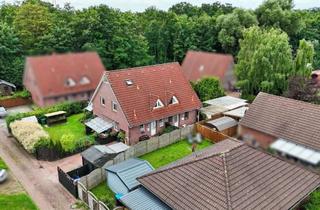 Haus kaufen in 26849 Filsum, Doppelhaus mit Doppeloption – Anlageobjekt & Wohntraum