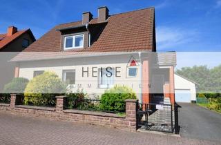 Haus kaufen in Gerhard-Hauptmann-Straße, 37699 Fürstenberg, 1- bis 2-Familienwohnhaus mit Doppelgarage in ruhiger Wohnlage mit kleinem Gartenteich