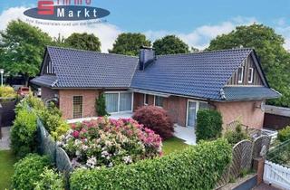 Einfamilienhaus kaufen in 32609 Hüllhorst, Hüllhorst - Winkelbungalow mit ausgebautem Dachgeschoss