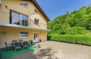 Haus kaufen in 55779 Heimbach, Heimbach - Zweifamilienhaus| ca. 215 m² Wohnfläche | ca. 3.500 m² Grundstück | Anbau von 2002 | 2 Garagen