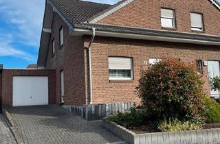 Doppelhaushälfte kaufen in 41812 Erkelenz, Erkelenz - Attraktive Doppelhaushälfte mit großer Garage in Hückelhoven