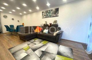 Wohnung kaufen in 57290 Neunkirchen, Moderne Eleganz trifft Wohnkomfort – Sanierte Eigentumswohnung