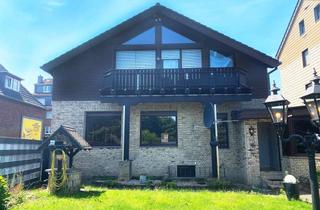 Haus kaufen in 46147 Holten, Stilvolles Dreifamilienhaus mit einem Anbau und acht Garagen in zentraler Wohnlage!