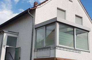Einfamilienhaus kaufen in 61194 Niddatal, Einfamilienhaus mit Anbau, Garten und Garage in Niddatal/Ilbenstadt