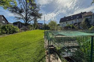 Einfamilienhaus kaufen in 42349 Cronenberg, Großzügiges Einfamilienhaus mit Einliegerwohnung, Gartenidylle & Doppelgarage in Cronenberg