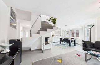 Wohnung kaufen in 85551 Kirchheim, Stilvoll wohnen auf zwei Etagen - Maisonette mit Garten, Kamin, Designküche und mehr in Heimstetten