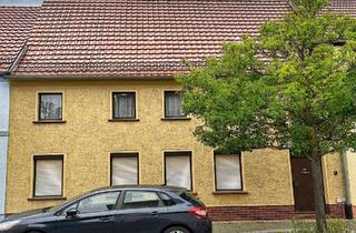 Haus kaufen in 04916 Herzberg, Charmantes, renovierungsbedürftiges Reihenmittelhaus mit Garten und 2 Garagen in Herzberg