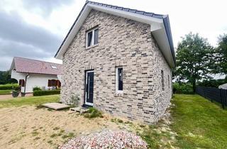 Einfamilienhaus kaufen in 26907 Walchum, Licht, Luft & Lifestyle – Neubau Einfamilienhaus mit offener Küche und Naturpanorama zum Verlieben
