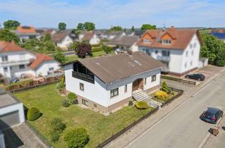Einfamilienhaus kaufen in 61203 Reichelsheim, Großzügiges Wohnhaus mit über 300 m² in ruhiger, feldnaher Wohnlage von Reichelsheim-Weckesheim