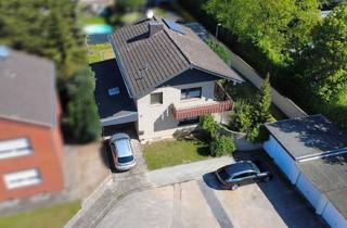 Einfamilienhaus kaufen in 50226 Frechen, Familienfreundliches Traumhaus – mit Garten, Terrasse, zwei Garagen und viel Stauraum im Keller