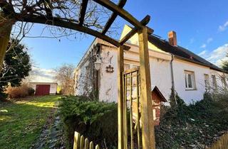 Doppelhaushälfte kaufen in 39387 Oschersleben, Doppelhaushälfte mit Brunnen, Garten u. Nebengelass