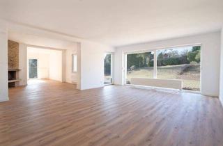 Wohnung kaufen in 49205 Hasbergen, Hasbergen - Sonnige Wohnung mit Einfamilienhaus-Flair und Garten