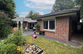 Einfamilienhaus kaufen in 25436 Heidgraben, Heidgraben - Wohnen im Grünen: Großzügiger Bungalow mit Terrasse, Garten & Pavillon