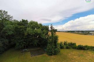 Wohnung kaufen in 38304 Wolfenbüttel, Große 4-Zimmer-Eigentumswohnung mit Balkon und traumhaften Blick in Feldrandlage!