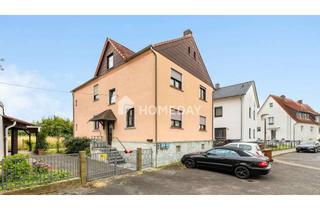 Mehrfamilienhaus kaufen in 61138 Niederdorfelden, Charmantes Mehrfamilienhaus mit großzügigem Raumangebot und zwei Balkonen