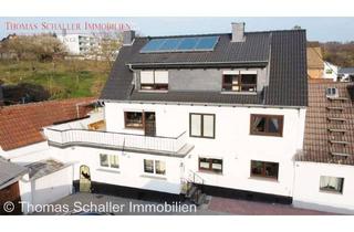 Haus kaufen in 63694 Limeshain, Zweifamilienhaus mit Nebengebäude, 2 Garagen und modernisierter Ausstattung