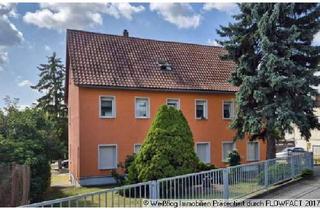 Mehrfamilienhaus kaufen in 01589 Riesa, Mehrfamilienhaus mit 4 Wohneinheiten, Garagen, Stellflächen und Gartene