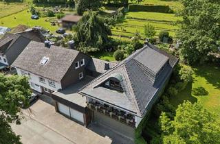Einfamilienhaus kaufen in 35716 Dietzhölztal, Einfamilienhaus und Kapitalanlage im Doppelpack - Traumhafte Grünanlage mit vielfältiger Nutzung