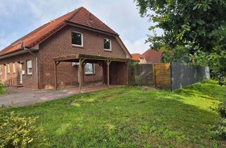 Doppelhaushälfte kaufen in 26683 Saterland, Doppelhaushälfte m. Carport in Saterland - OT Scharrel