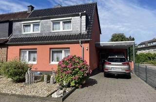 Doppelhaushälfte kaufen in 41515 Grevenbroich, Charmante Doppelhaushälfte in der Grevenbroicher Südstadt – Perfekt für Familien!