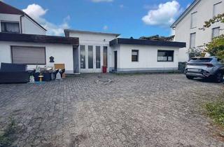 Immobilie kaufen in 68519 Viernheim, Attraktives Grundstück mit Bungalow und Gewerbefläche – Neubebauung oder Abrisspotenzial