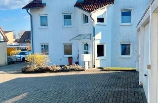 Wohnung kaufen in 78658 Zimmern, Zimmern ob Rottweil - Attraktive 3,5-Zimmer-Erdgeschosswohnung mit Terrasse und Garten