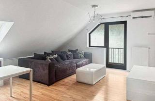 Wohnung kaufen in 63165 Mühlheim, Mühlheim am Main: Lichtdurchflutete 3-Zimmer-Dachgeschosswohnung mit Einbauküche