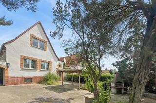 Einfamilienhaus kaufen in 06128 Böllberg-Wörmlitz, Sanierungsbedürftiges Einfamilienhaus mit traditionellem Flair auf einem großen Grundstück in Halle