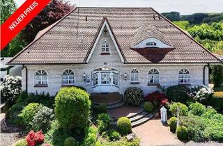 Haus kaufen in 59469 Ense, Sylter Stil trifft großzügigen Wohnkomfort
