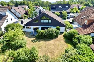 Einfamilienhaus kaufen in 63110 Rodgau, Freistehendes Einfamilienhaus in Traumlage- Offen, großzügig und umgeben von Grün -