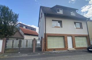 Haus kaufen in 63533 Mainhausen, Wohn-/Geschäftshaus (2 Wohnungen und Ladengeschäft) mit Doppelgarage in ruhiger Lage von Mainhausen