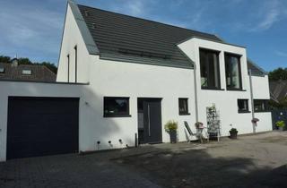 Einfamilienhaus kaufen in Lüttelbrachter Straße 4a, 41379 Brüggen, Modernes freistehendes Einfamilienhaus mit Garage in Brüggen-Born