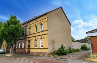 Haus kaufen in 06749 Bitterfeld, Charmantes Reihenendhaus mit Altbauflair und Garten – vielseitig nutzbar in zentraler Lage !