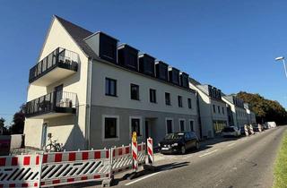 Wohnung kaufen in 76228 Wolfartsweier, Großzügige 3 Zimmer-Wohnung mit Garten