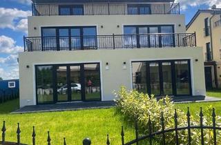 Wohnung mieten in 64846 Groß-Zimmern, Erstbezug mit Garten: Exklusive Wohnung mit Einbauküche unmittelbar am „Golfplatz"