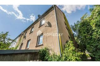 Haus kaufen in 52441 Linnich, Charmantes Zweifamilienhaus in ruhiger Lage mit großem Garten und vielseitigem Raumangebot
