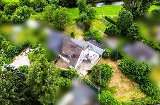 Haus kaufen in 51503 Rösrath, Zuhause im Grünen Charmantes Zweifamilienhaus mit Gästehaus!