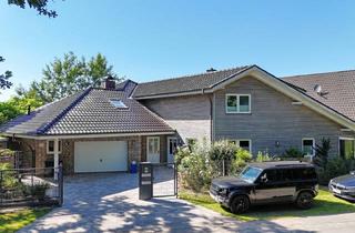 Haus kaufen in 25551 Lohbarbek, Hochwertiges Zweifamilienhaus in ruhiger Lage am Feldrand von Lohbarbek!