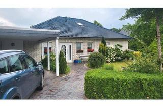 Haus kaufen in 27793 Wildeshausen, Wildeshausen - Walmdach-Bungalow, Wintergarten Kamin