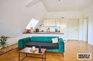 Wohnung kaufen in 86381 Krumbach, Residieren statt Wohnen, Charmante 2,5 Zimmer-DG-Wohnung im historischen Schloss