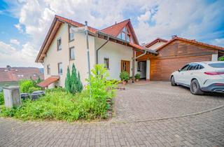 Haus kaufen in 79790 Küssaberg, Familienidylle mit Einliegerwohnung – Wohnkomfort in ruhiger Hanglage