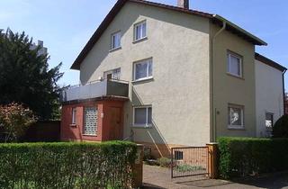 Doppelhaushälfte kaufen in 60529 Schwanheim, Idyllische Doppelhaushälfte mit großem Garten und Doppelgarage in Frankfurt am Main Schwanheim